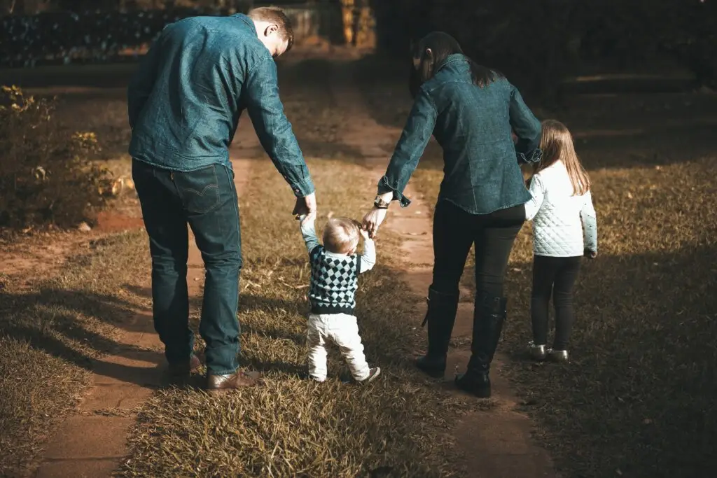 Writing a Will in Poole and Bournemouth? Get in Contact Today Family walking together on path.